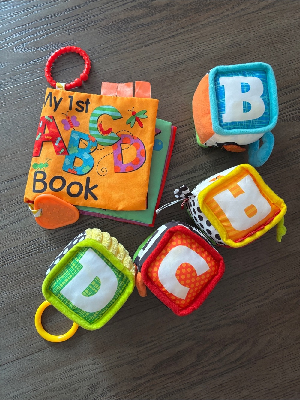 Source Unknown Orange ABC Cloth Book with Multi-Colored Soft Letter Blocks